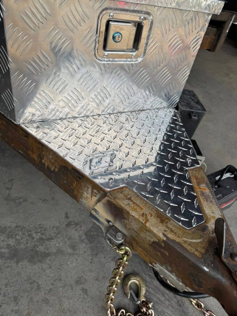 Photo of diamond plate storage box addition for a trailer